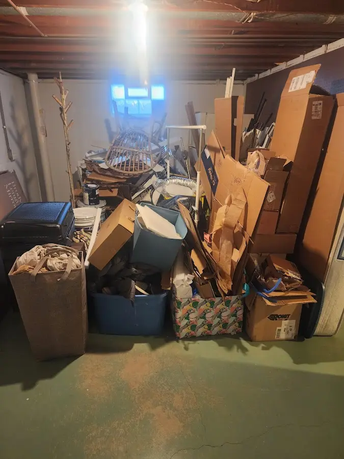 Roll-off dumpster container at job site for 2 Yard Dumpster Rental in Clarkson